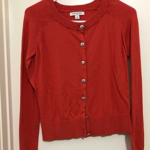 Red-orange cardigan